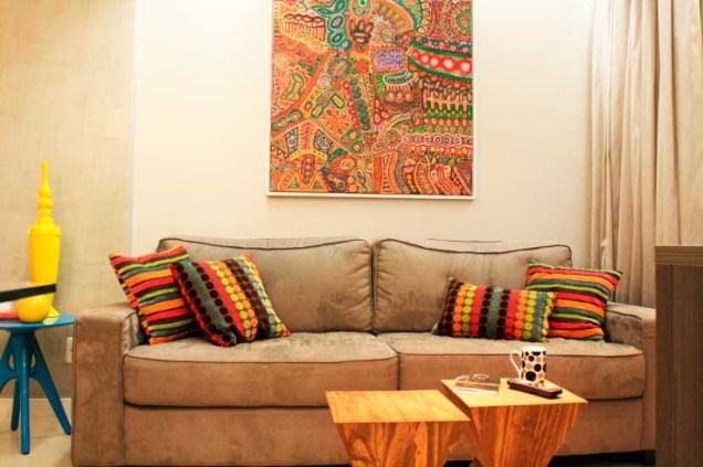 Sala de estar de um apartamento de 60 m², em Fortaleza. Projetado por Studio Toca.