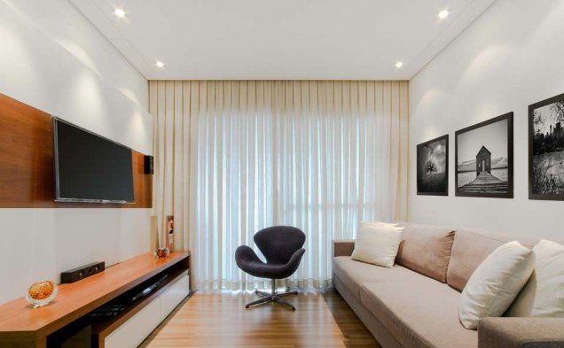 Sala de estar de um apartamento de 90 m², em São Paulo. Projeto de Caroline Manfrin.