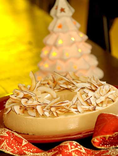 Do Carlota, a panna cotta de dulce de leche com lascas de coco douradas tem t...