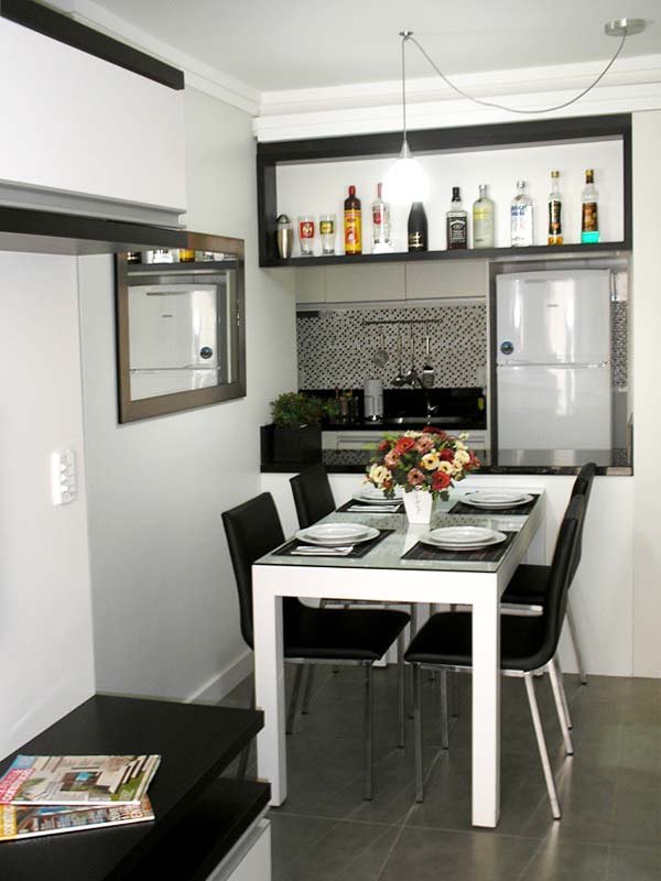 Sala de jantar de um apartamento de 54 m². Projeto de Ana Paula Boufleur.