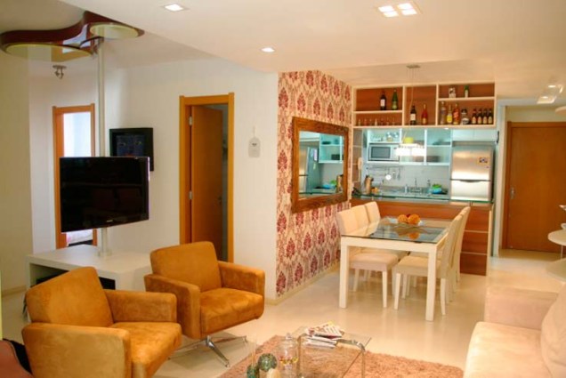 Sala de estar e jantar de um apartamento de 80 m², em Porto Alegre. Projetado por Caio Rodrigues de Santi.