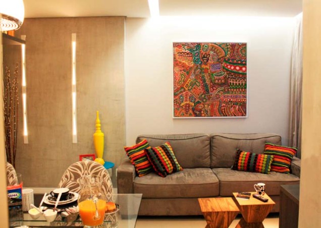 Sala de estar de um apartamento de 60 m², em Fortaleza. Projetado por Studio Toca.