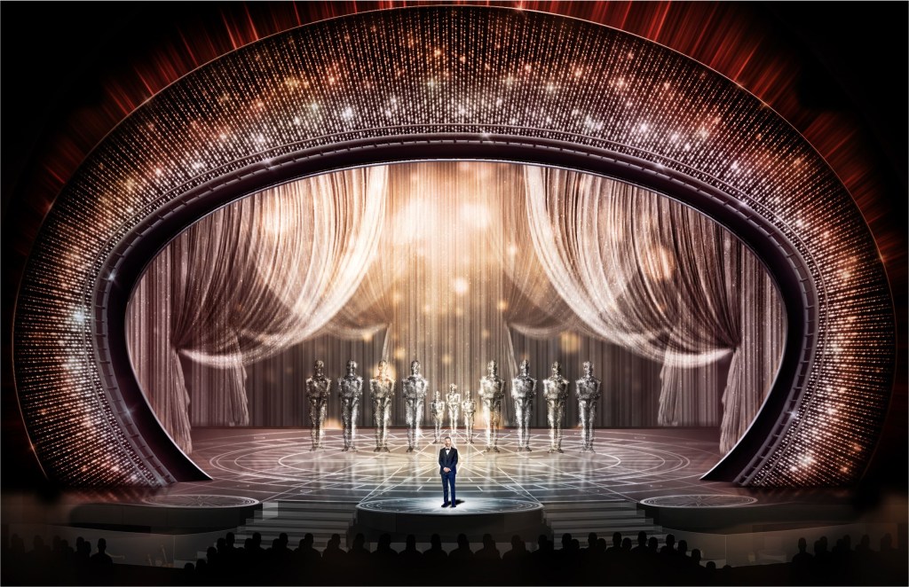 Cenário do Oscar com panos e estatuetas gigantes com cristais swarovski