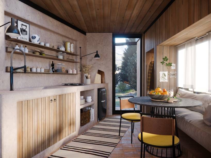 Loft dos Gêmeos, por Grão Arquitetura | Dani e Guto determinaram uma paleta de tons harmônicos, como o rosa-nude, mostarda, terrosos e cinza e destacaram a escada metálica, com estrutura vazada, que funciona como o ponto central da casa, separando o espaço do casal da área social, sem interromper a luminosidade e integração entre os ambientes.