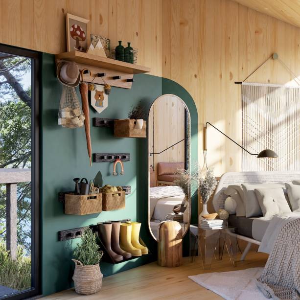 Loft Casal com Bebê, por Nina Zamith | Já o hall de entrada virou o “cantinho do explorador”, com as botas e ferramentas prontas para as caminhadas pela região: “Coloquei ali tudo que eles precisam para sair e ainda deixei pendurado um punhado de galhos… É essa a vibe simples e natural dessa família e desse lugar lindo”, diz Nina.
