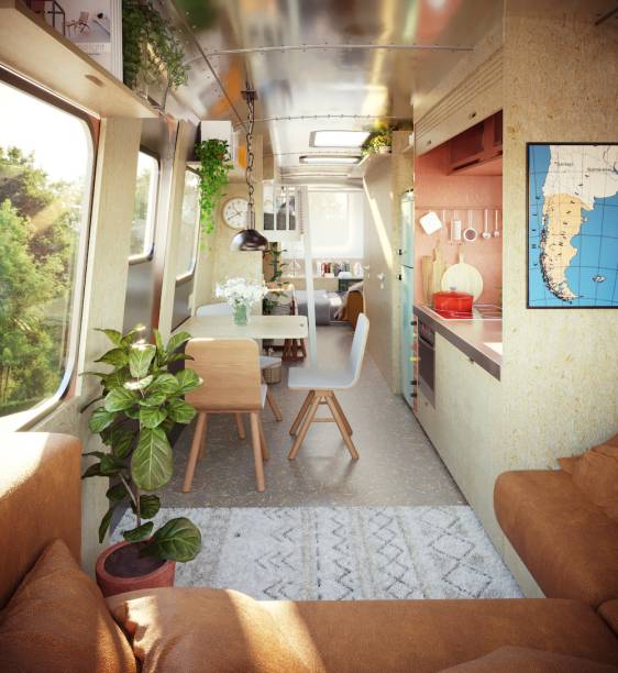 AIRSTREAM, por Cajoo.studio | Camas, bancadas e mesa são dobráveis, reforçando o tom multiuso. Toda a marcenaria (Nossa Casa) utilizou um material reciclado e sustentável, desenvolvido a partir de restos de madeira, cimento e papel. As cores - bege, grafite, rosa velho e marrom - servem para delimitar subespaços e facilitam que as crianças entendam melhor o funcionamento e a disposição dessa casa móvel.