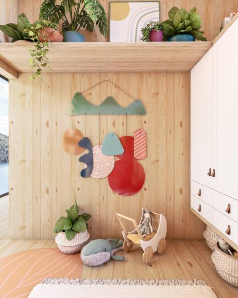 Quarto da Cora, por Elefante Design + Uáuá | Foi batizado com o tema da mostra, “Refúgios” - lançamento da Uauá, que ainda desenvolveu tapetes de algodão e vinílico, trocador, almofadas, quadros e um móbile de acrílico, de grandes proporções. Presa na parede, a peça se transforma em uma peça lúdica e decorativa, estimulando a criatividade e imaginação.