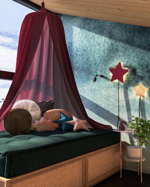 Sala de Leitura, por Marcella Reynol Arquitetura | O papel de parede aquarelado com nuvens e o painel com estrelinhas da Mama loves you ajudaram a trazer o azul pra dentro do ambiente.