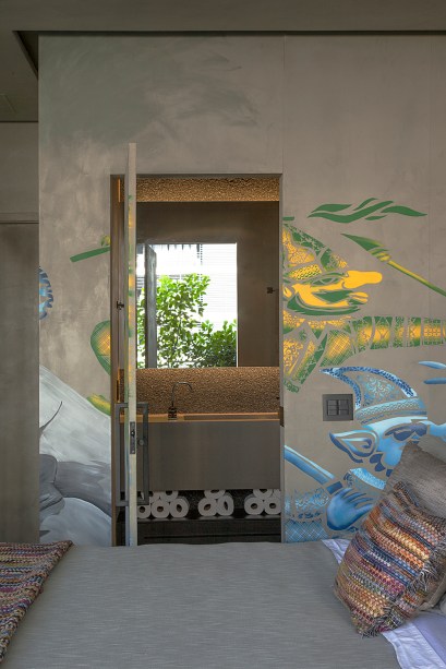 Cimento queimado e grafite: confira o décor deste apê de 42 m²