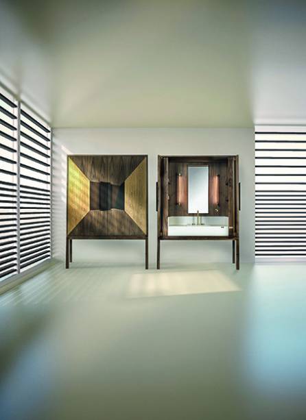 Como esconder um lavatório: Produzida em Dekton (superfície ultracompacta), a peça na cor Zenith nasceu da parceria entre as gigantes Cosentino e Riva 1920. As marcas convidaram o arquiteto edesigner argentino Daniel Germani para criar o armário DeKauri (0,55 x 1,50 x 2 m) que envolve o lavatório. O móvel faz uma homenagem à resiliência da natureza, pois tem como matéria-prima madeiras da espécie kauri que ficaram enterradas sob lama e água por milhares de anos na Nova Zelândia. Metais de Fantini Rubinetti e iluminação de Juniper Design completam o conjunto. Como esconder um lavatório: Produzida em Dekton (superfície ultracompacta), a peça na cor Zenith nasceu da parceria entre as gigantes Cosentino e Riva 1920. As marcas convidaram o arquiteto edesigner argentino Daniel Germani para criar o armário DeKauri (0,55 x 1,50 x 2 m) que envolve o lavatório. O móvel faz uma homenagem à resiliência da natureza, pois tem como matéria-prima madeiras da espécie kauri que ficaram enterradas sob lama e água por milhares de anos na Nova Zelândia. Metais de Fantini Rubinetti e iluminação de Juniper Design completam o conjunto.