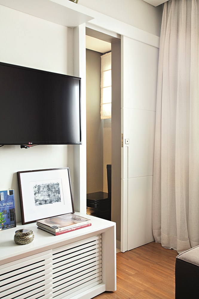 decoração-de-apartamento-pequeno-traz-integração-de-ambientes-quarto-painel