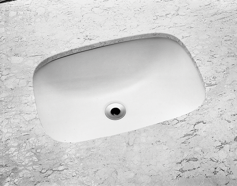 Colada na parte interna do tampo com massa plástica ou silicone para cerâmica, a peça com formato retangular mede 16,5 x 37 x 50,5 cm. Da Incepa.