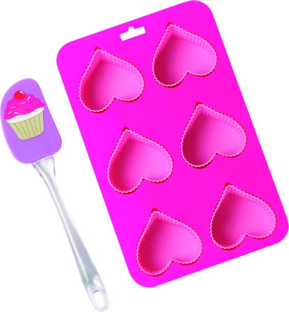 Kit Cupcake Coração Doce, <span>de silicone e polipropileno</span> ( 17 x 5 x 29 cm). Da Mor. Custa R$69,99. Em <a href="https://www.gotoshop.com.br/Moveis/SaladeJantar/CadeiradeJantar/Kit-Cupcake-Coracao-Doce-De-Cozinha-Mor-6393920.html?utm_source=revista&utm_medium=gc_mc&utm_campaign=edicaojunho&utm_content=201706">abr.ai/kit-cupcake</a><span class="discountTxtPlus"></span>