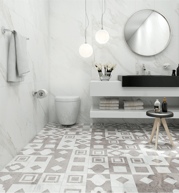 Reparou no piso deste banheiro? Em uma reinterpretação de formas geométricas tradicionais com linguagem contemporânea, o porcelanato digital polido Kit Palace, da
coleção Marmo, espelha-se nos mármores branco calacata e cinza new grey. Submetido a um processo exclusivo de polimento e acabamento com esmalte de alta performance, o material conjuga brilho intenso com resistência a riscos, manchas e desgaste. Para pisos e paredes, sai por
R$ 25,82 o kit com dez peças retificadas de 20,5 x 20,5 cm cada uma. Da Biancogres.