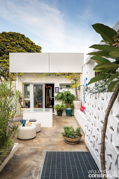 obra-converte-terraco-deteriorado-em-um-recanto-acolhedor-e-funcional-para-receber-visitas-01