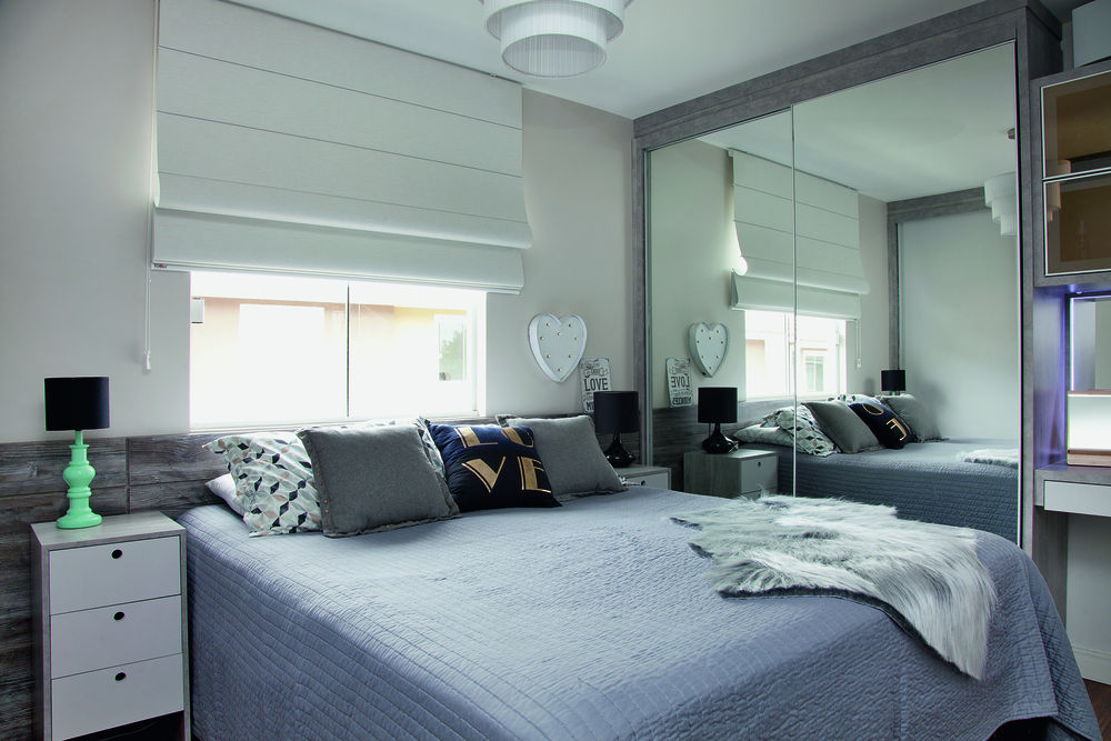 Projeto de sobrado aposta em combinação de estilos na decoração quarto