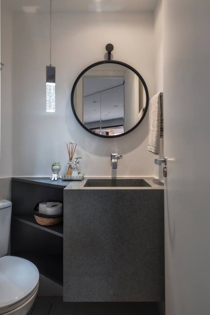 13-integração-varanda-gourmet-e-quarto-gamer-confira-o-projeto-deste-apê Lavabo com espelho redondo