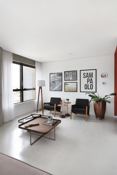 Estilo industrial, arte e integração marcam este apartamento em São Paulo