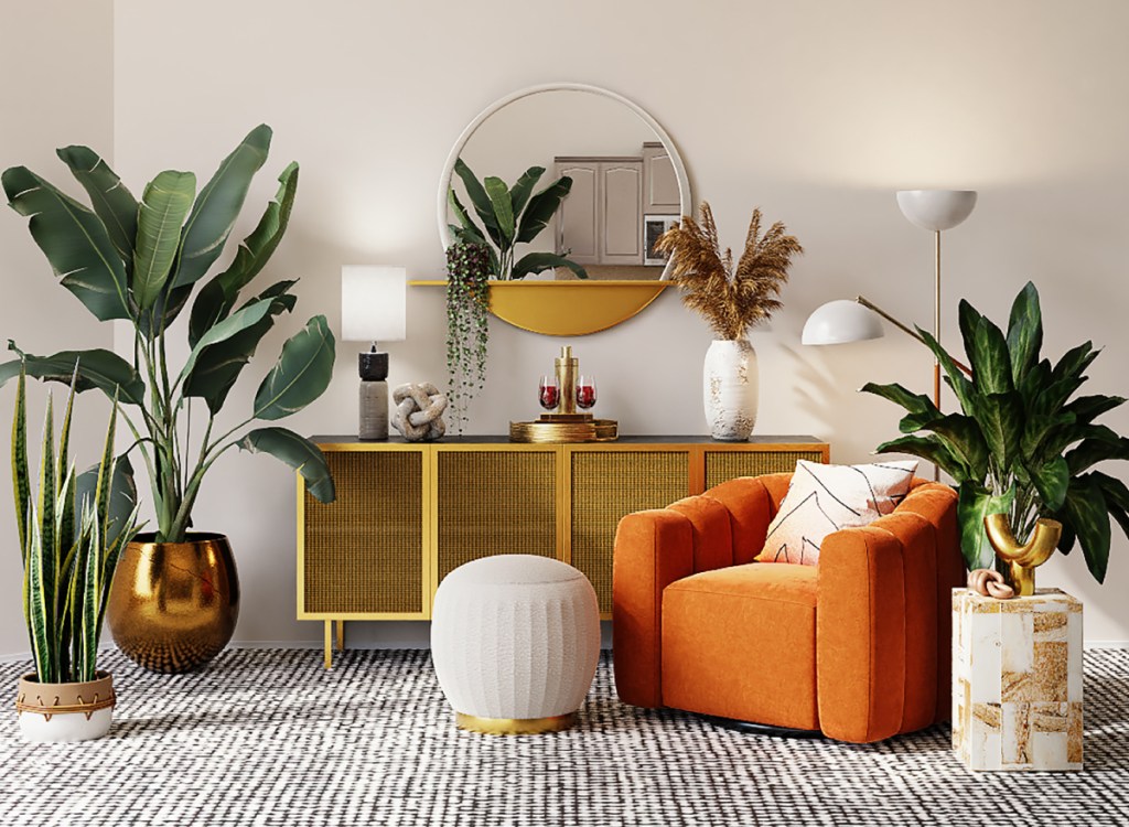 Sala com sofá laranja, planta em vaso e tapete cinza