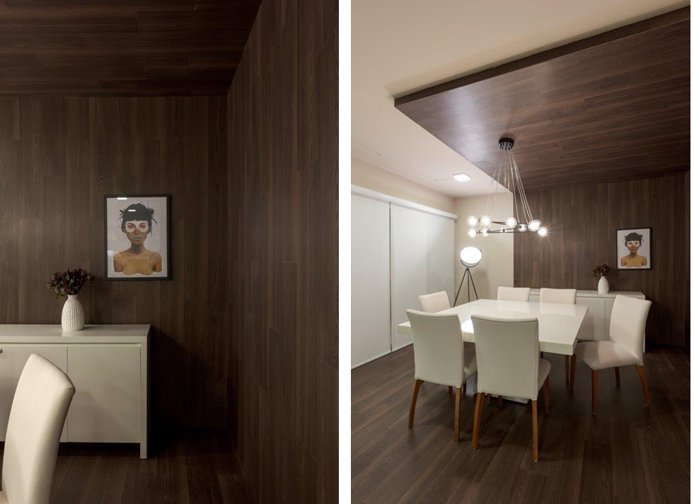 Duas fotos mostram uma sala de jantar em que o piso amadeirado sobre pelas paredes e atinge parte do teto, delimitando a área.