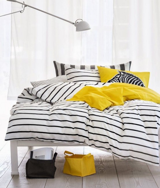 40 inspirações de decorações listradas DigsDigs (9) Cama com roupa de cama listrada.