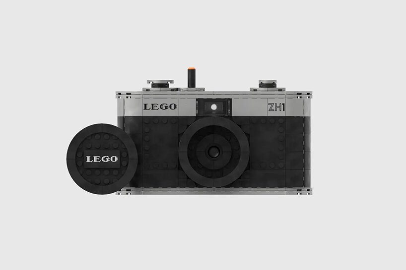 Câmera analógica preta com detalhes em cinza totalmente feita com peças de lego.