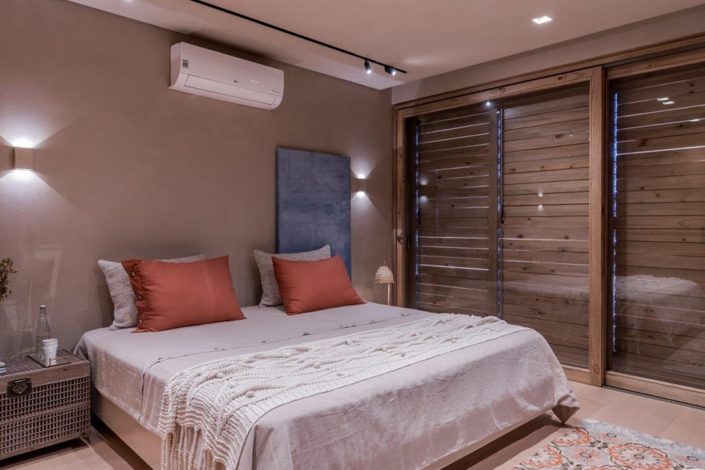 triplex apartamento vista decoração helo marques são paulo quarto suite cama madeira