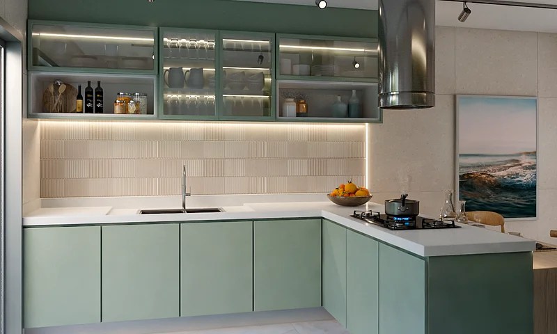 Cozinha em L com marcenaria verde clara