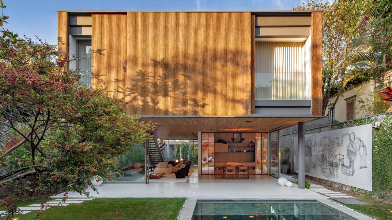 Estrutura metálica grandes vãos livres térreo casa 464 m2 Terra Capobianco e Galeria Arquitetos arquitetura fachada jardim paisagismo vidro piscina