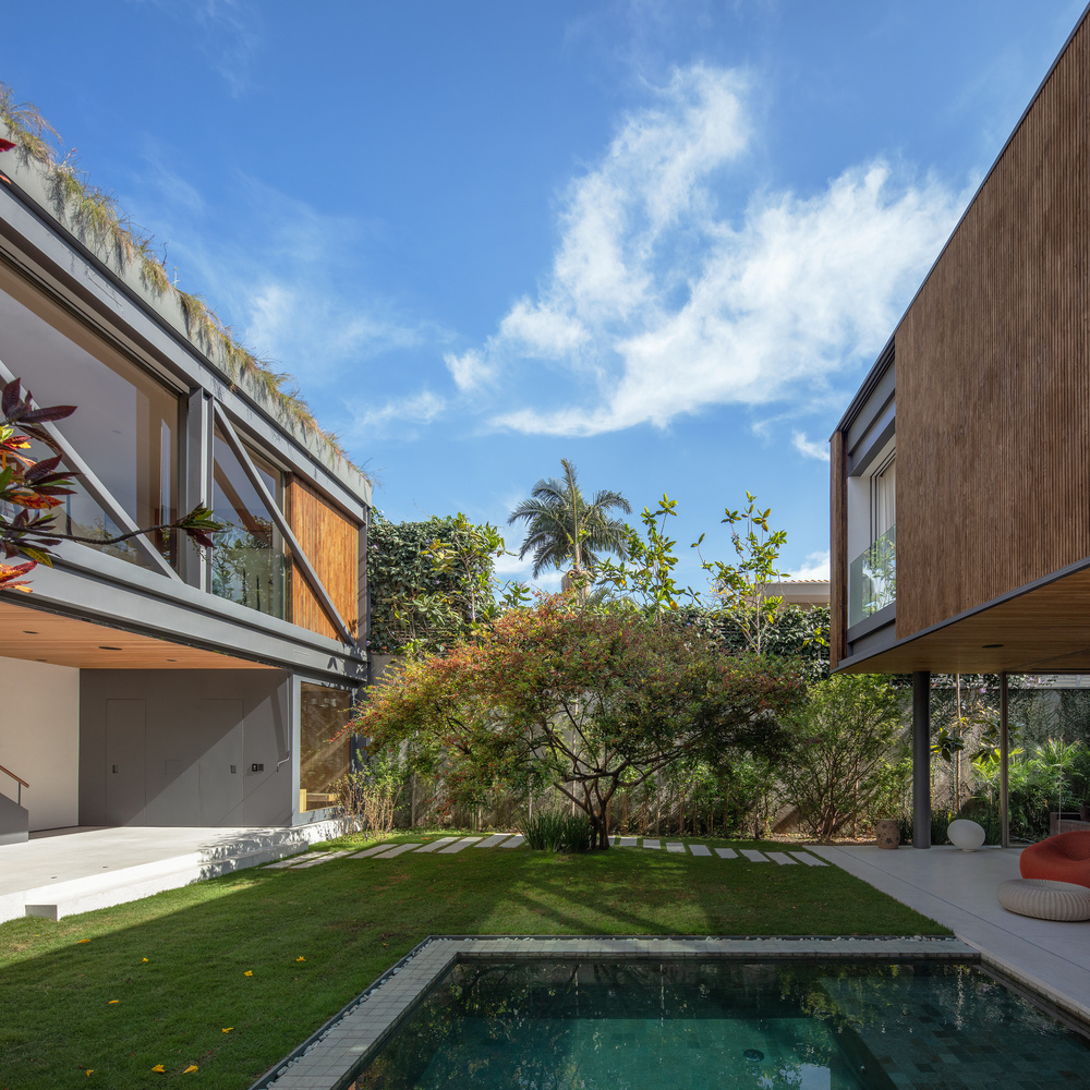 Estrutura metálica grandes vãos livres térreo casa 464 m2 Terra Capobianco e Galeria Arquitetos arquitetura fachada jardi paisagismo vidro piscina