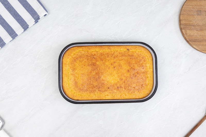 Top view of Homemade cornbread in the baking tray Canjica salgada