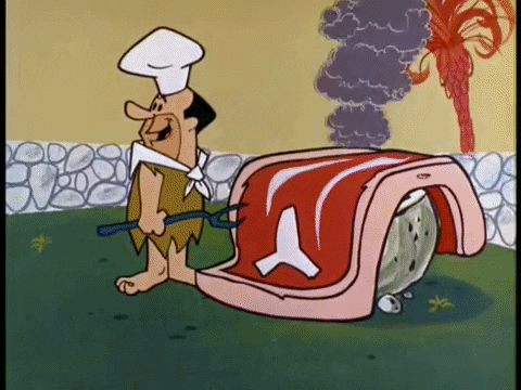 Gif dos Flintstones fazendo churrasco