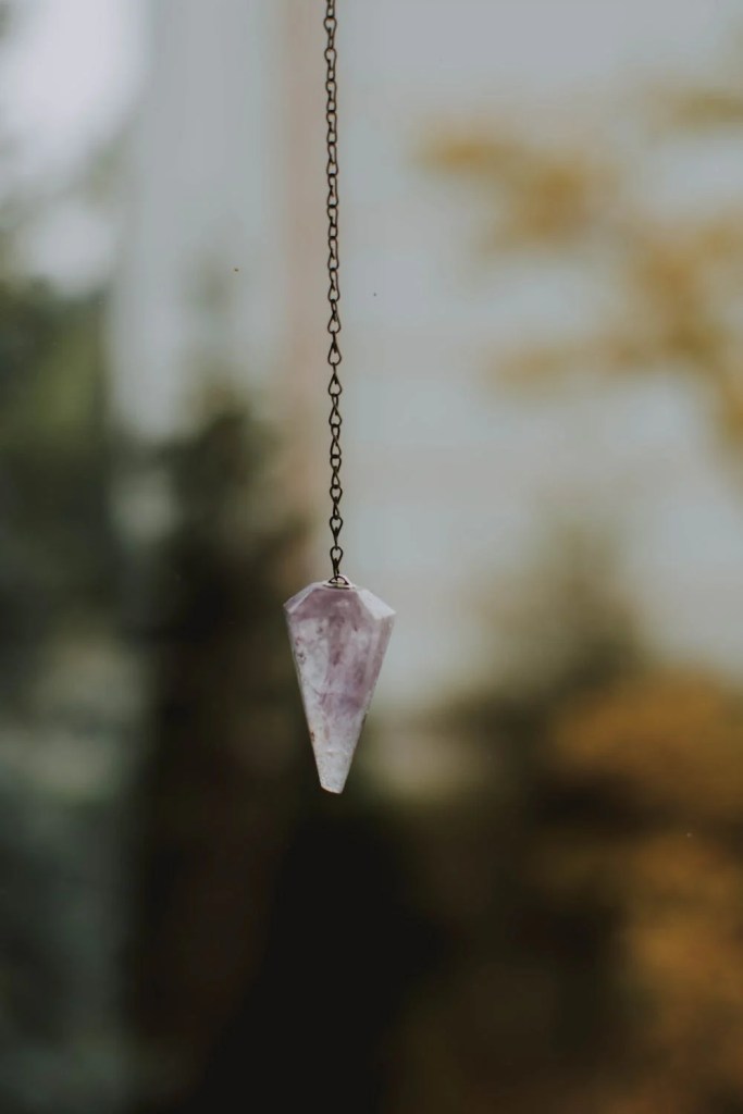 Pêndulo de cristal transparente