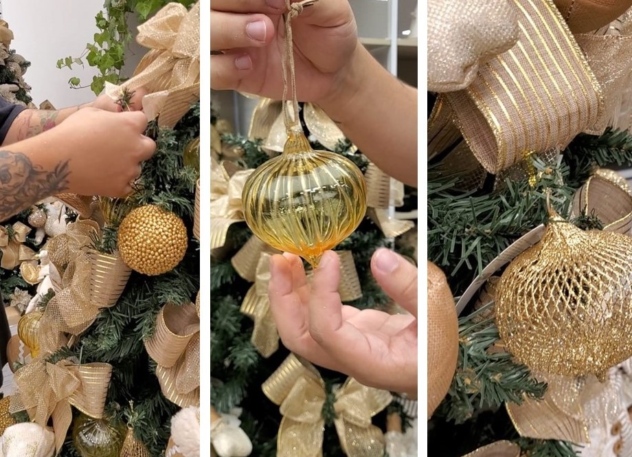 Passo a passo para montar uma Árvore de Natal igual às do shopping. Na foto, bolas de natal sendo colocadas.