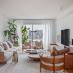 Apê de 180 m² com sala íntima equilibra minimalismo e conforto