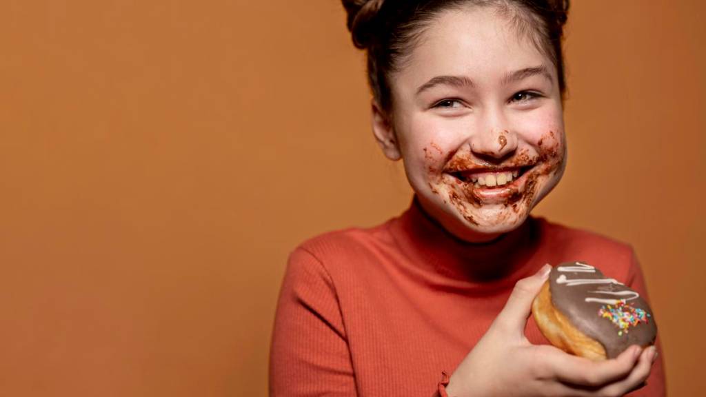 Aprenda a tirar mancha de chocolate das roupas