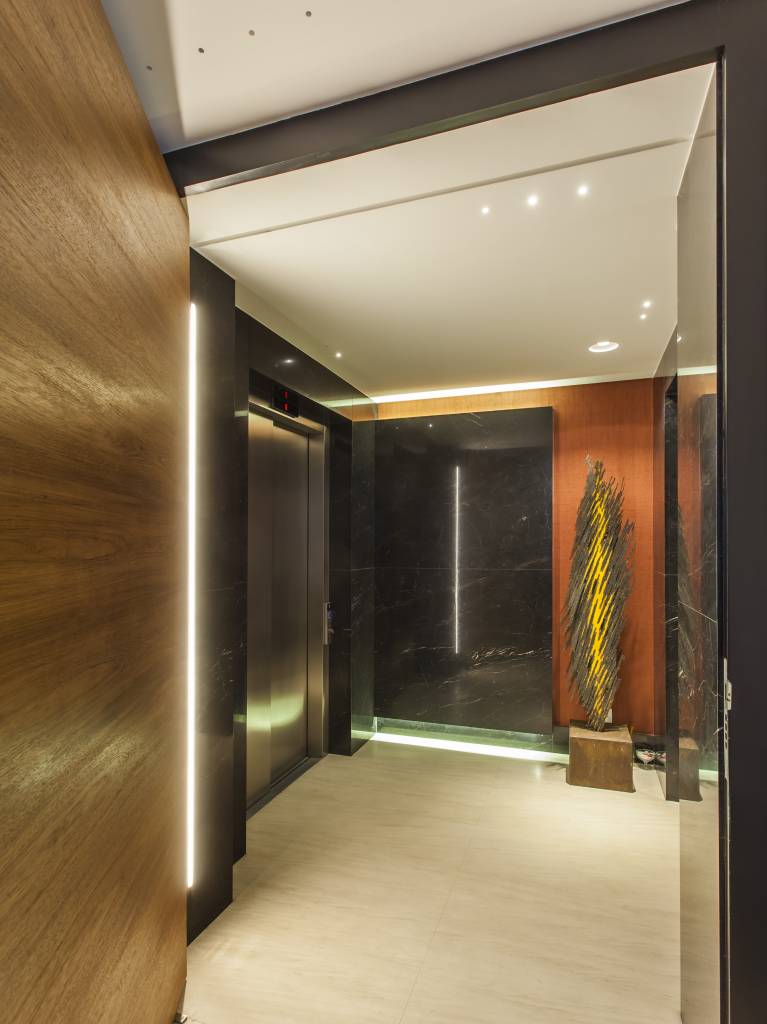5 boas ideias para decorar o hall de entrada. Projeto de Korman Arquitetos.