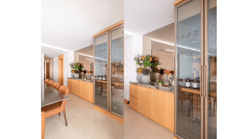 Cinco formas de explorar o pé-direito em uma residência. Projeto de Andrea Teixeira Arquitetura e Interiores. Na foto, cantinho de bar com adega.