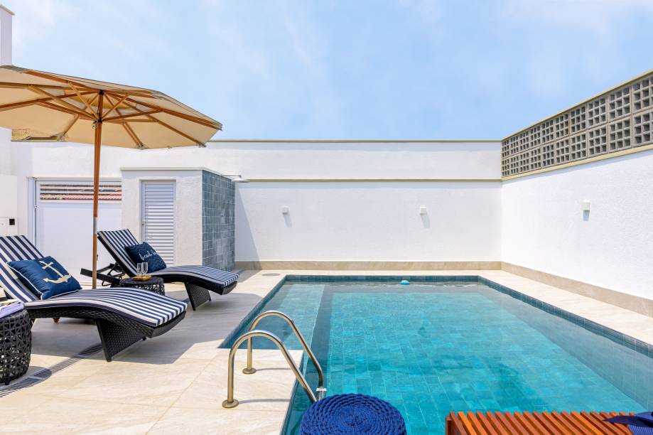 Sobrado de praia de 300 m² tem décor minimalista e memória afetiva